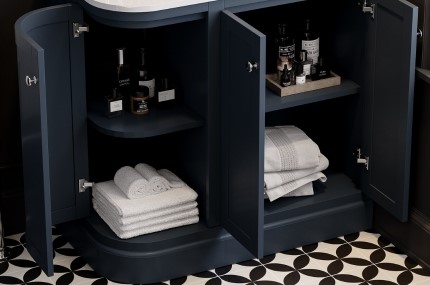 Blue Basin Vanity Unit with doors open and storage shelf